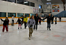 Family skating during Snowman Mania